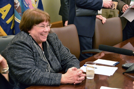Acting SRS Secretary chatting with reporters after the announcement of her appointment.