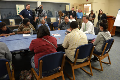 Governor Brownback and JAG participants talking