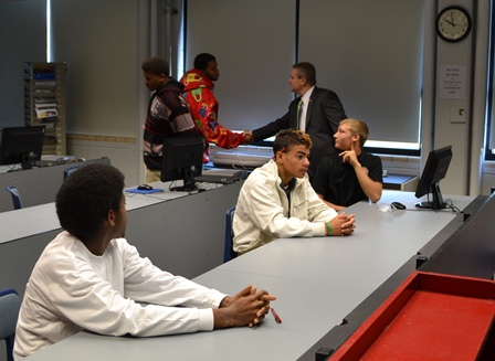 Principal Rob met young men in a leadership class taught by community advocate Curtis Pitts.