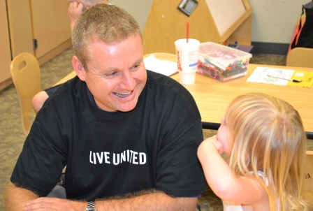 The preschoolers treated Secretary Siedlecki to a demonstration of silly faces.